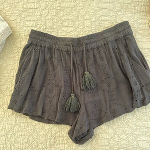 Black Free People eyelet shorts with tassels